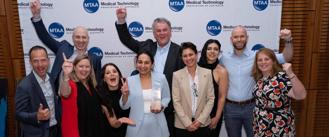 Group photo of smiling Boston Scientific employees celebrating Boston Scientific ANZ wins MTAA Women in MedTech Company Champion Award 2024.
