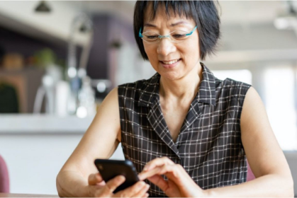 woman interacting with smartphone device